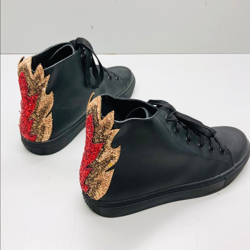 Katy Perry Women”s high top sneaker